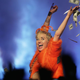 Image for article titled Taylor Swift Finally Shows Belly Button, Proves She's Human